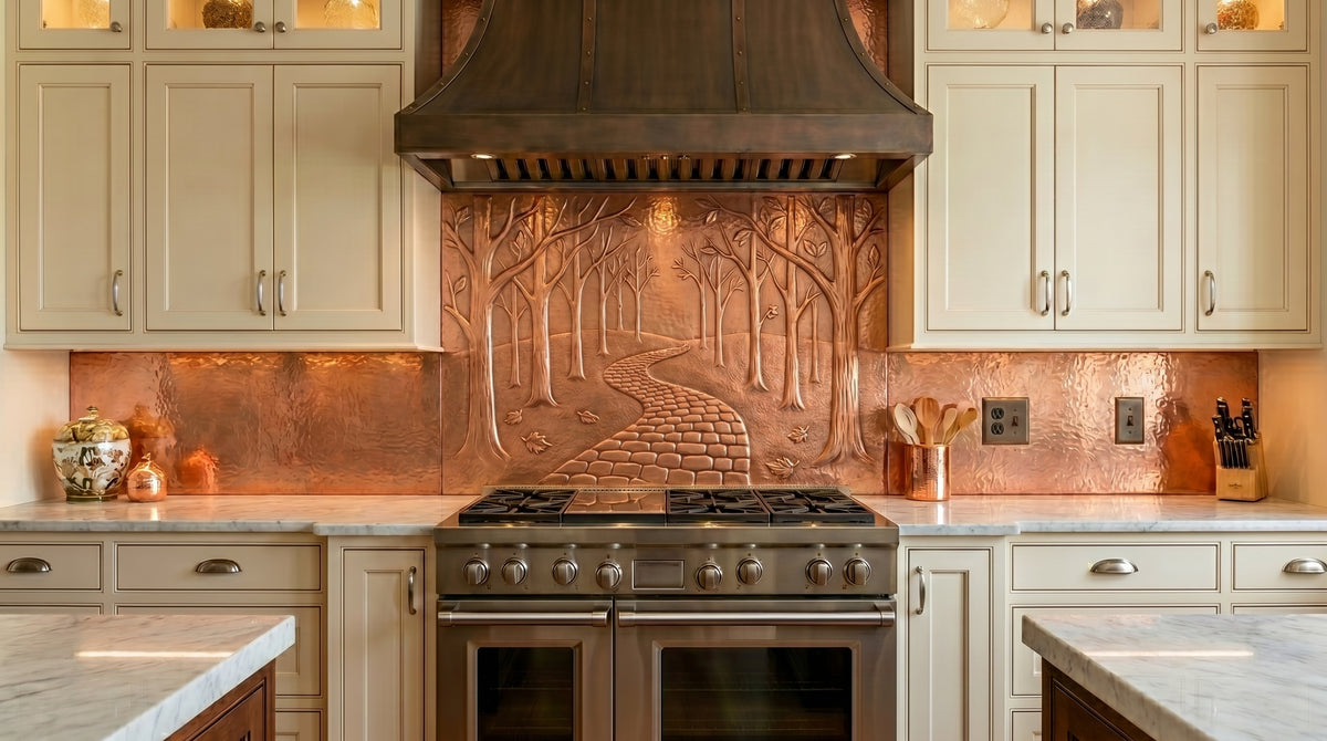 Handcrafted copper kitchen backsplash featuring a winding woodland path beneath graceful trees. Custom sizes available for stove backsplashes or complete kitchen backsplash installations.