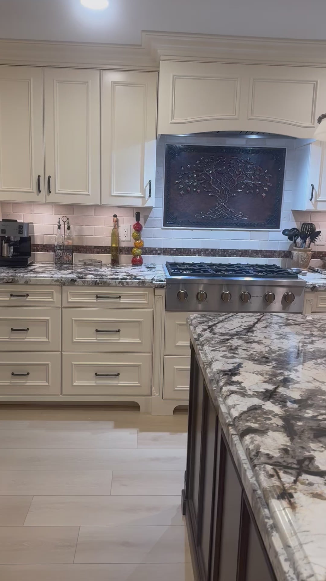 Luxury Kitchen with a Copper Kitchen Backsplash