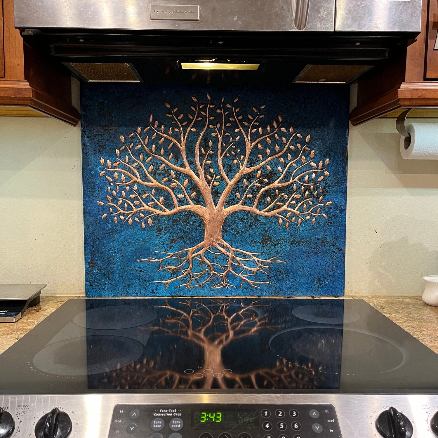 Shop the Ancient Tree Copper Backsplash, a hand-hammered real copper panel featuring a deeply rooted tree design. Perfect for farmhouse kitchens, rustic lodges, and nature-inspired interiors, this is an artisan copper backsplash.
