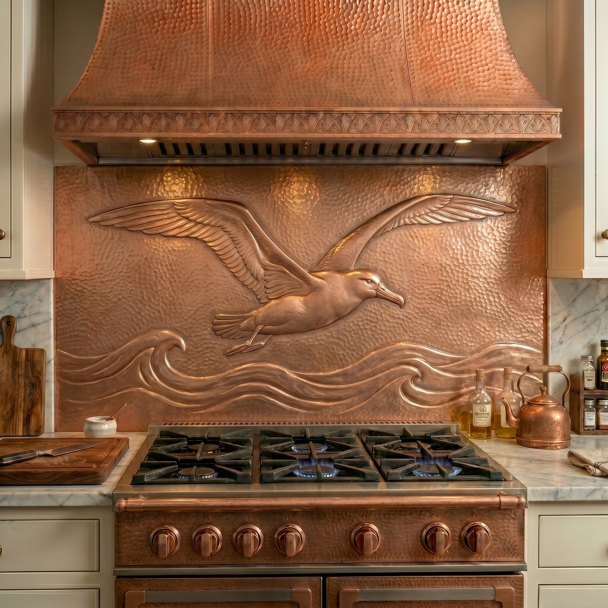 Albatross copper stove backsplash handcrafted from real copper. Coastal copper kitchen backsplash panel with ocean waves, available in custom sizes and finishes.