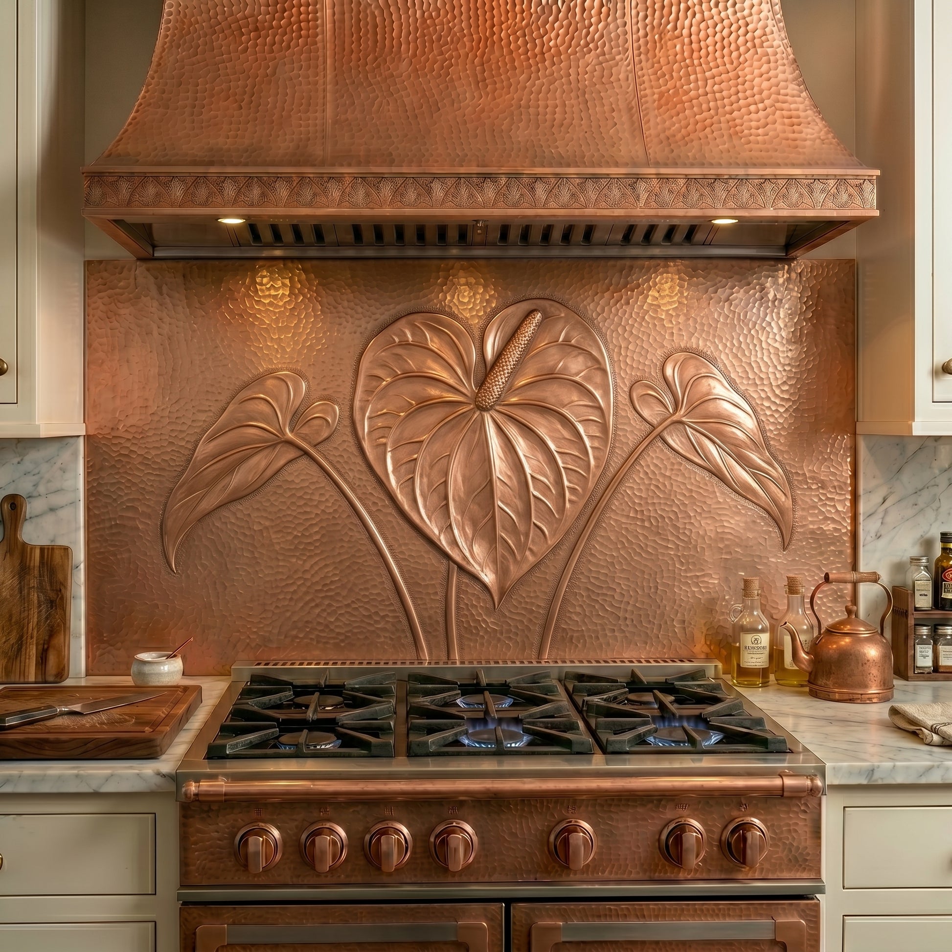Handmade Anthurium Flower copper stove backsplash and kitchen backsplash panel. Available as a single panel behind the stove or a complete custom copper backsplash installation with matching side panels beneath surrounding cabinets. Custom sizes, finishes, and installation options available.