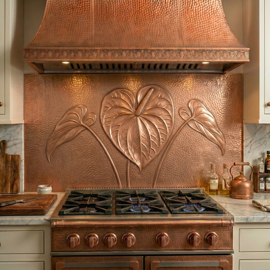 Handmade Anthurium Flower copper stove backsplash and kitchen backsplash panel. Available as a single panel behind the stove or a complete custom copper backsplash installation with matching side panels beneath surrounding cabinets. Custom sizes, finishes, and installation options available.