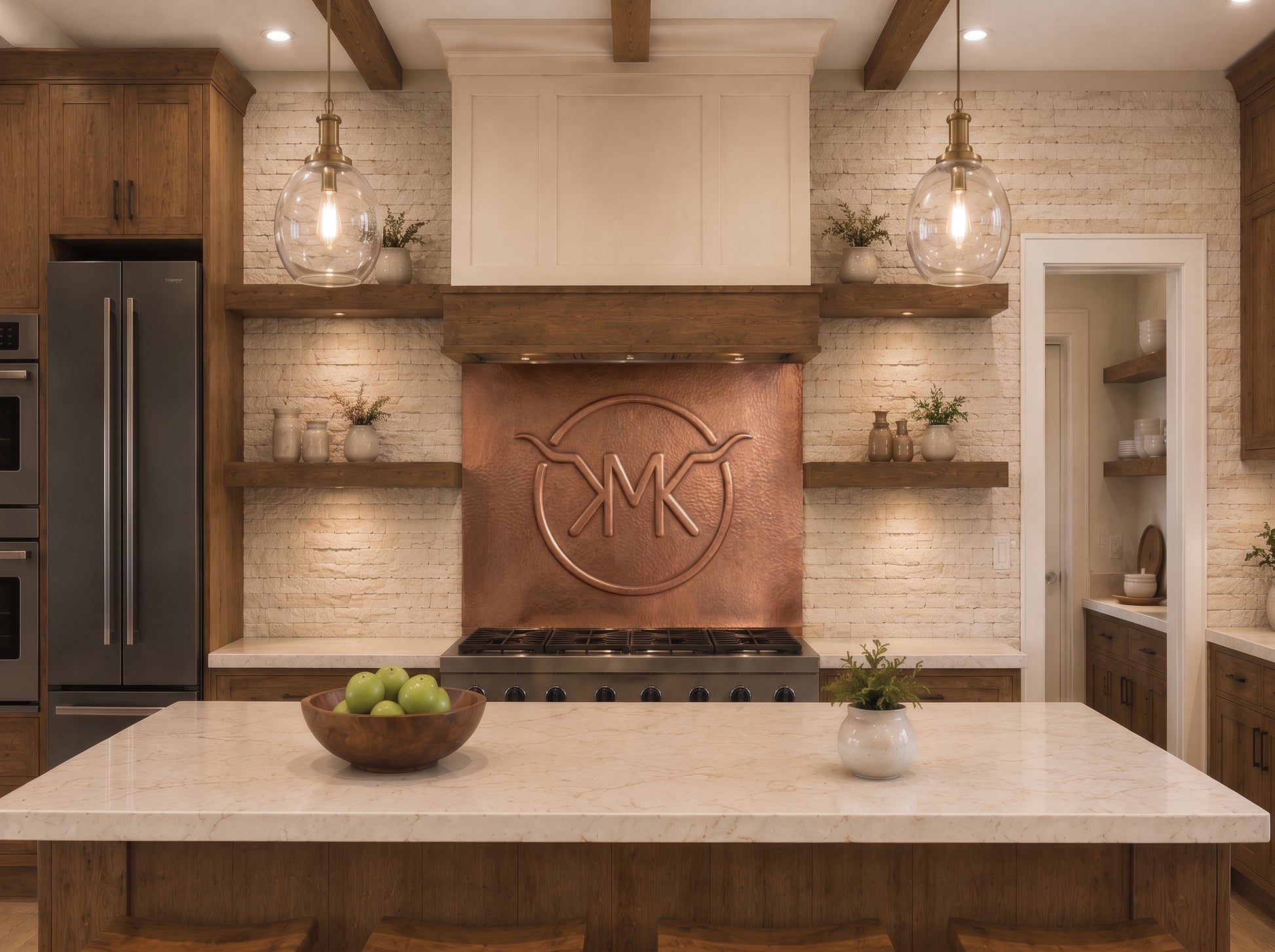 Hand-hammered family brand in copper installed as a kitchen backsplash behind a range, featuring a custom ranch-style brand formed in raised copper relief on a textured copper background in a warm wood and white kitchen.