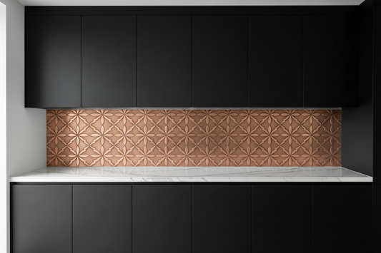 Wide copper panel filling full counter-to-cabinet wall space in bold black kitchen — classic Moroccan arabesque interlocking geometric star and cross pattern in repoussé relief across 72-inch wide panel, warm natural copper tone, fine stipple background, matte black flat-front cabinets, white Calacatta marble countertop, modern dramatic kitchen