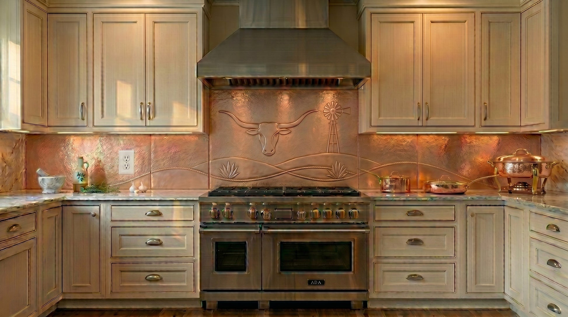 Custom copper backsplash for gas cooktops featuring a longhorn steer, ranch windmill, and Western landscape design. Handmade from real copper and custom built to your exact size.