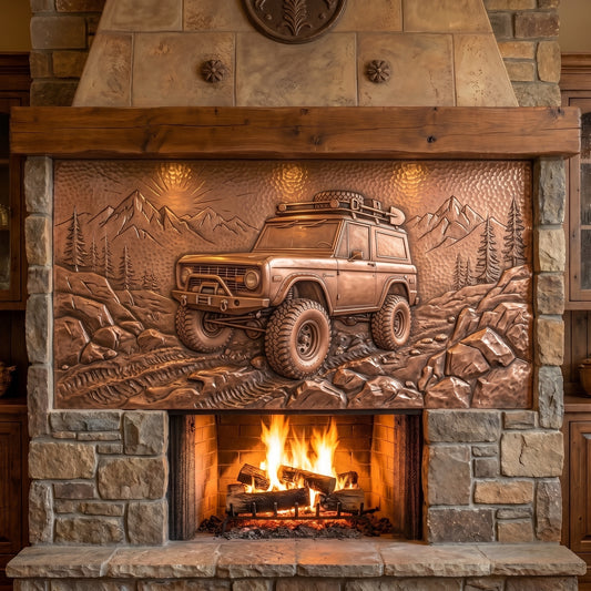 A rustic stone fireplace with a large copper relief panel depicting a rugged off-road vehicle traveling through mountains and trees, with a warm fire burning below.