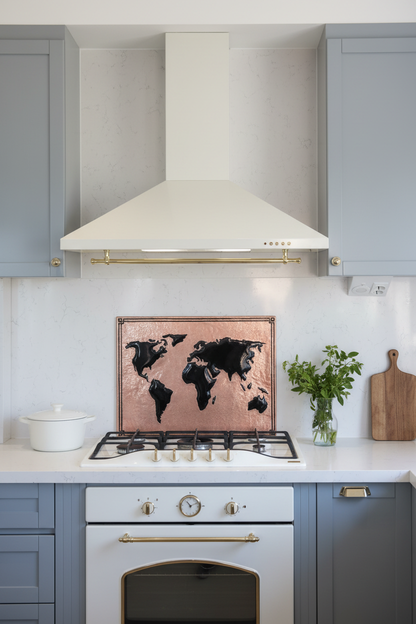 Contemporary World Map Copper & Black Backsplash with White Cabinets and Marble Counters