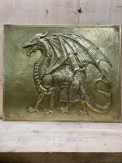 Handmade dragon brass kitchen backsplash for behind the stove. Custom fantasy wall decor for medieval homes, game rooms, libraries, and dragon lovers.