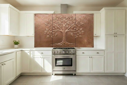 Handmade copper stove backsplash with Tree of Life repoussé design, 3-panel set, warm brown copper, hand-hammered stipple texture, white shaker kitchen