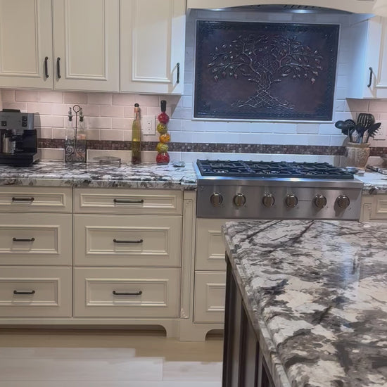 Luxury Kitchen with a Copper Kitchen Backsplash